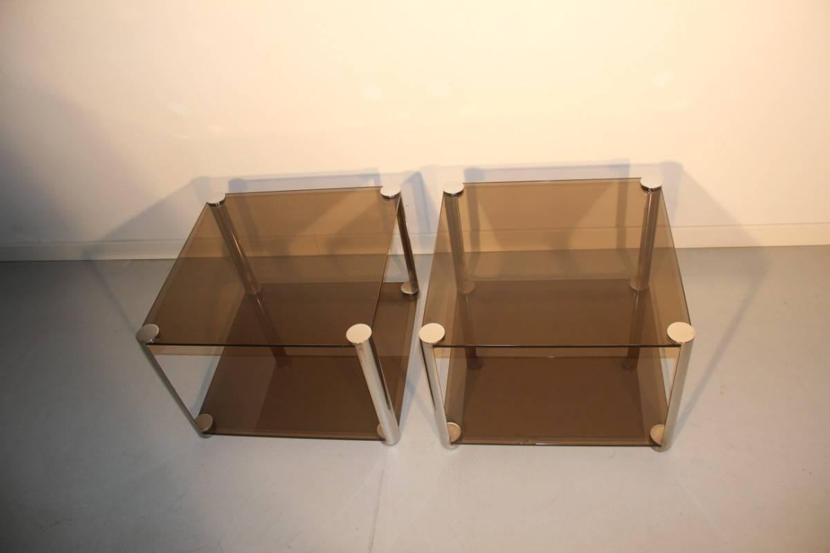 Pair of nightstands minimal design Alberto Rosselli, 1960s, chromed metal structure, grey glasses.