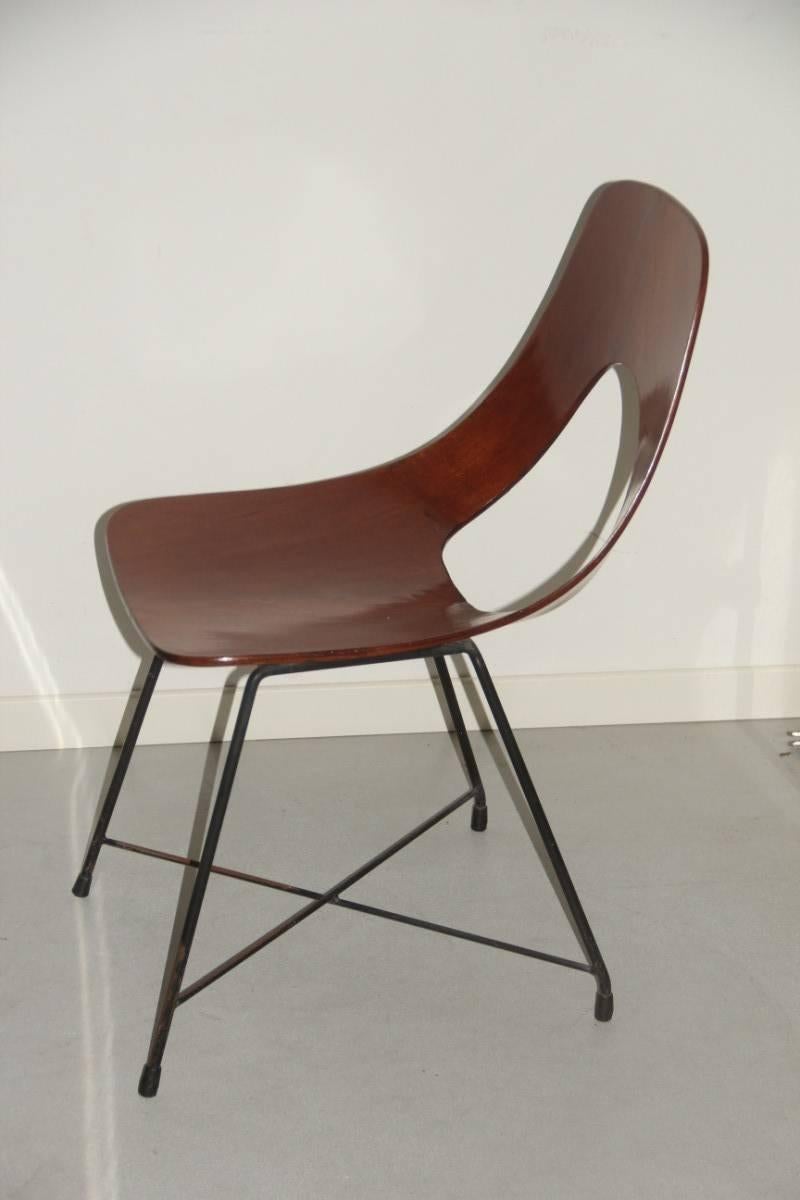 Sculptural chair Augusto Bozzi for Saporiti 1950s, Italian design. Curved perforated wood, perforated curved wood.