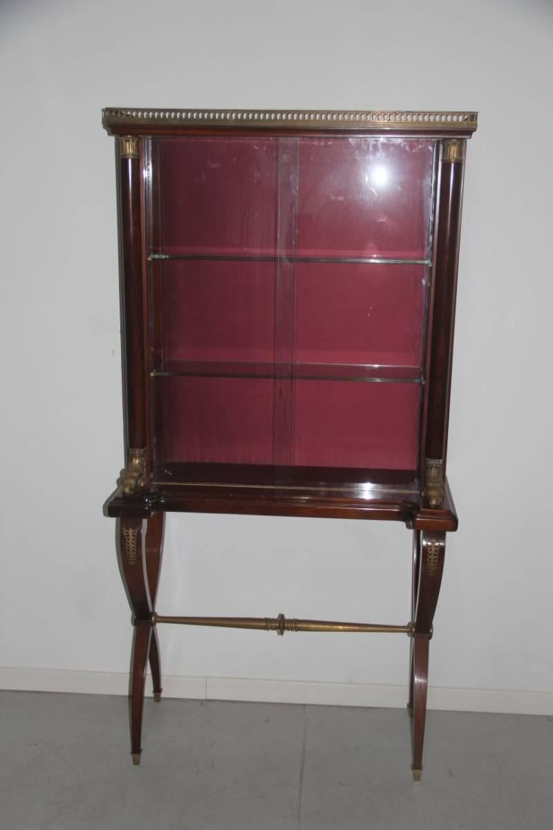 Showcase rosewood design 1950, Italian, very special cross-legged, brass parts.