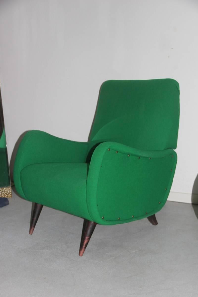 Pair of Italian mid-century design armchairs, woven wool blend in green cotton, feet in diagonal wood, unique, Minimalist design.

Paolo Buffa Attributed.