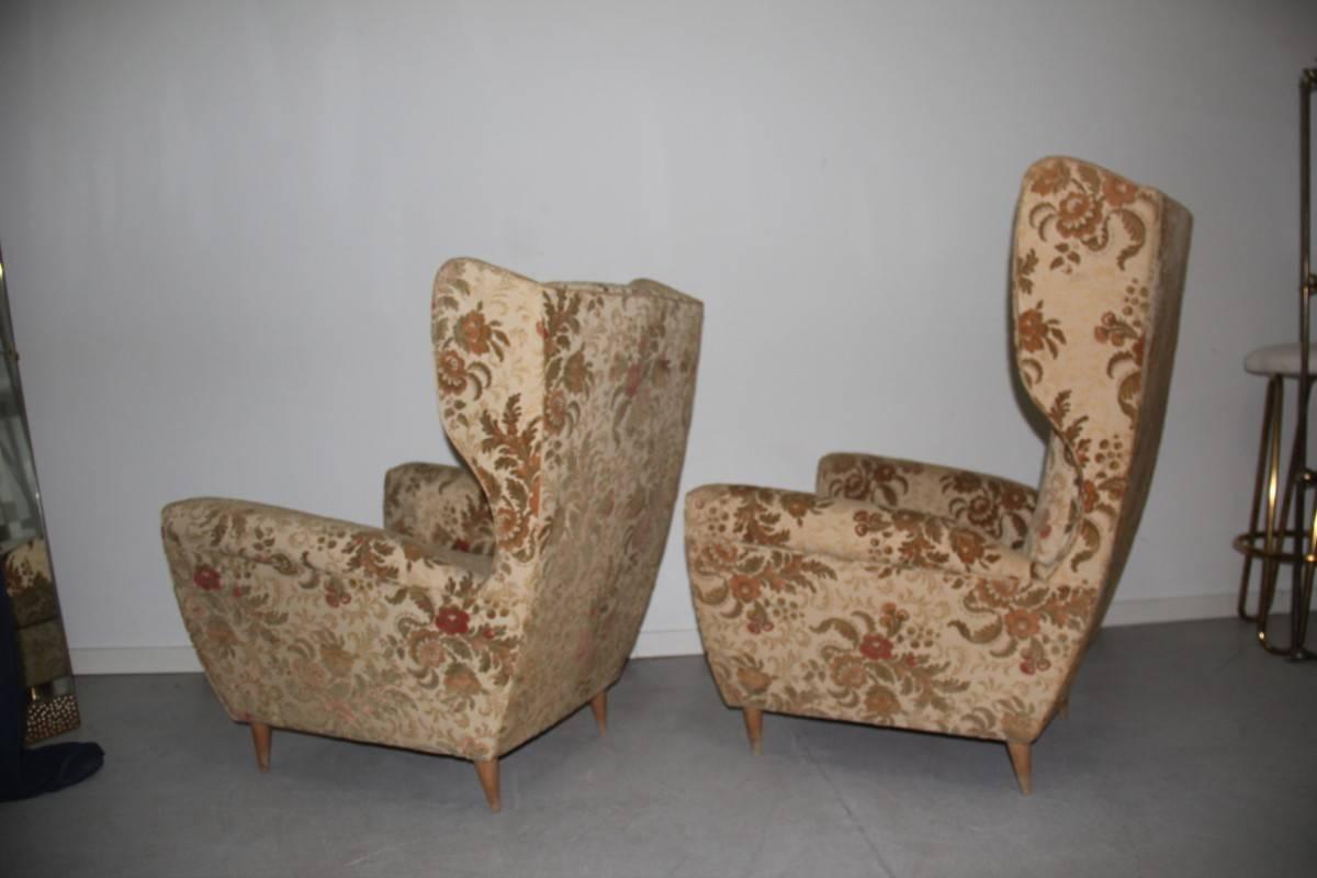 Particular armchairs him and her high back, fabric with original flowers of his time, very unique shape resembles the style of the great master Gio Ponti.

Measures: The big chair is high cm.115, depth 90 cm, width cm.75, the her height 100 cm,