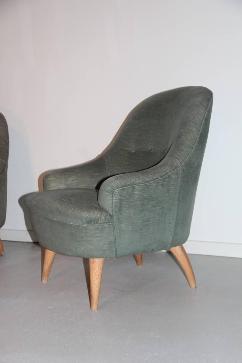 Italia Mid-Century armchairs particular form, curved rear foot, front foot cone, very unique shape and design is very reminiscent of the style of the great master Gio Ponti. Original velvet old.