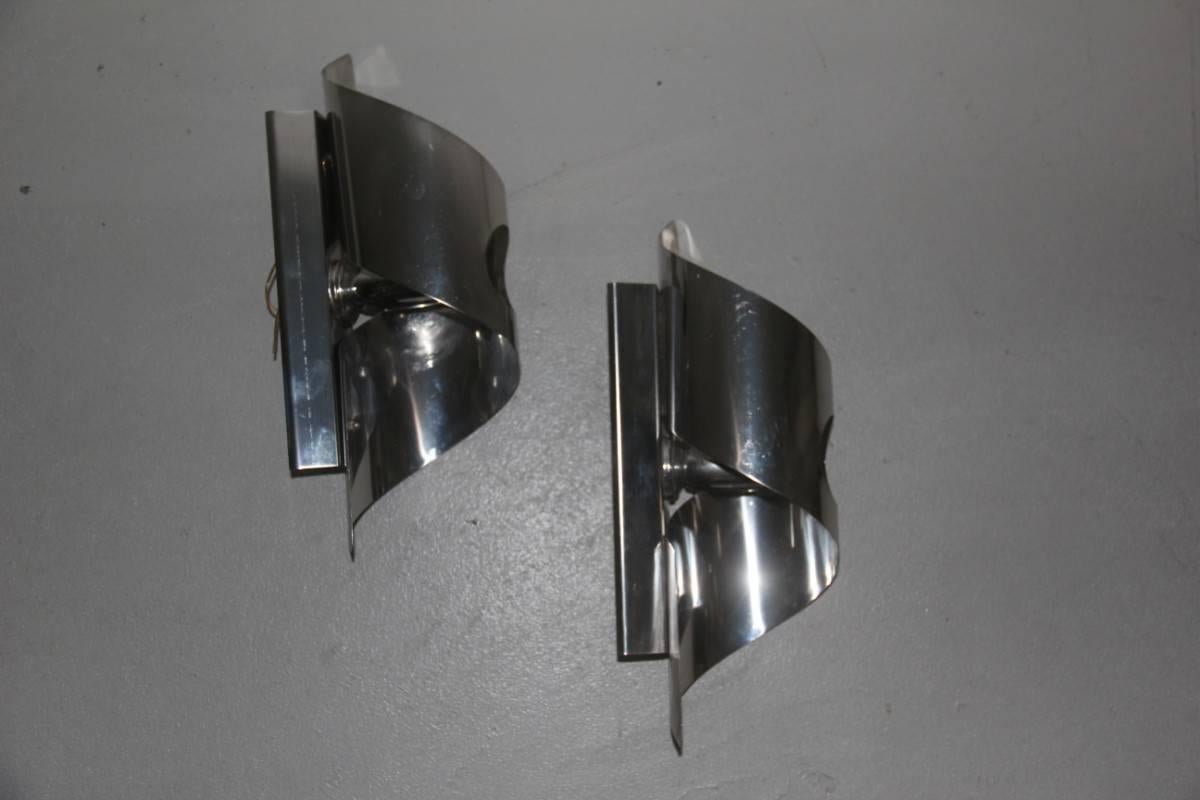 Pop art curved steel wall sconces, 1970s.