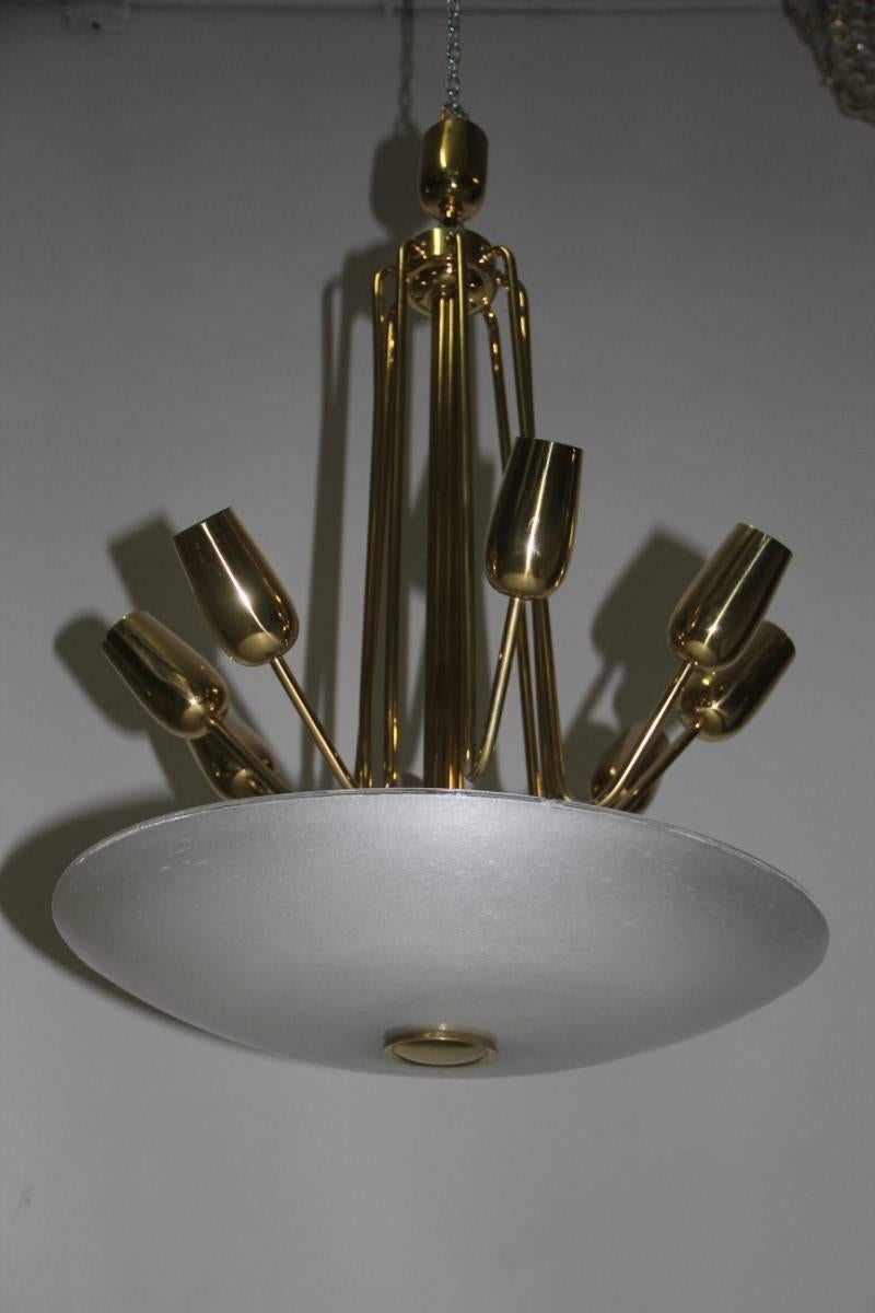 Mid-Century Italian chandelier Brass and glass pulegoso.