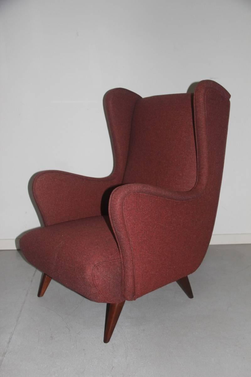 Italian 1950s armchair design and exceptional shape Mid-century, the style is shaped by the great architect Paolo Buffa.