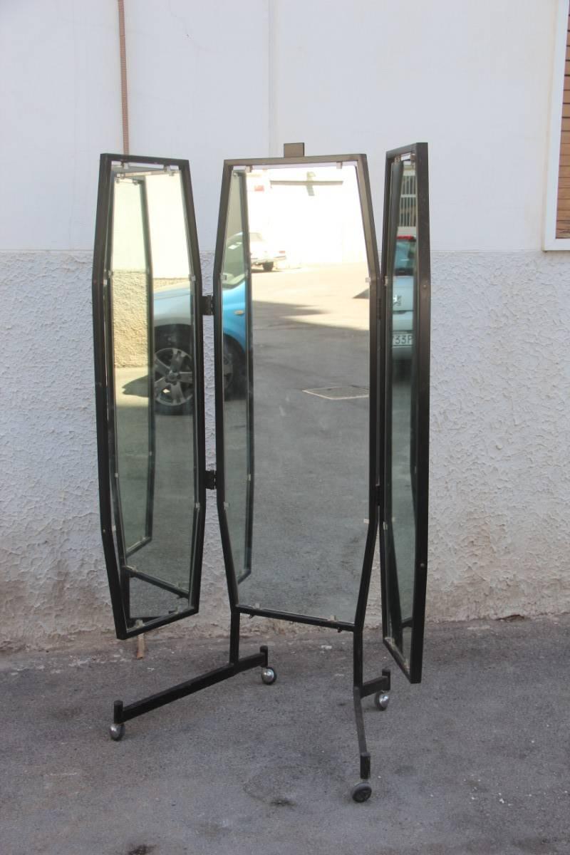 Particular mirror 1950 very rare Italian mid-century design, made of metal and side sliding doors, something really original. Ideal for shop and showroom class.