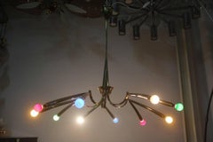 Gran araña Oscar Torlasco Diseño italiano en latón