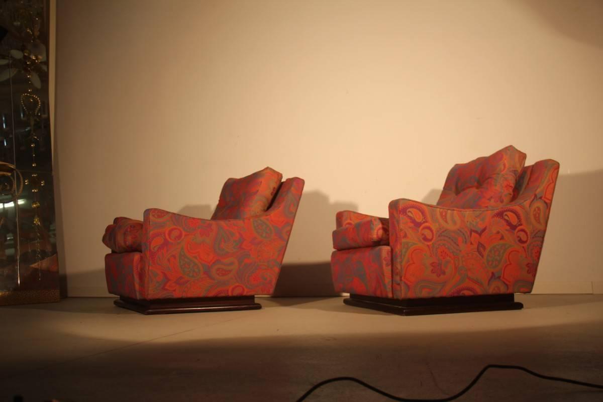 Art Deco armchairs Italian design very elegant and particular form, the fabric is in excellent condition, in multicolored damask, wooden foot.