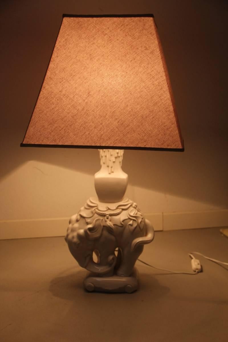 Italian ceramic elephant table lamp 1970s, fabric hat. Very elegant and particular design.