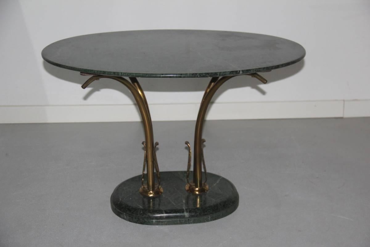 Green marble coffee table, 1950s in the Italian design Borsani style, carved brass legs, elegant and unique design, of great value.