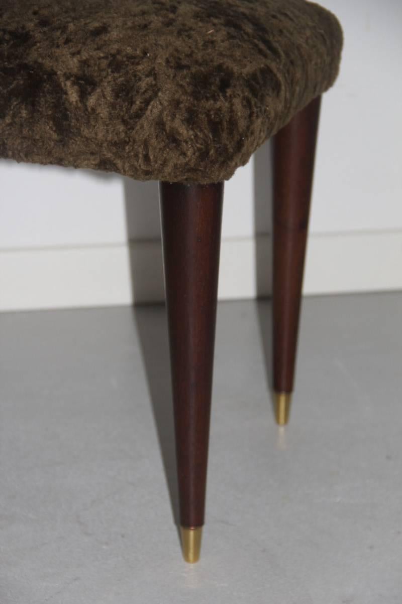 Midcentury pair of Italian design stools, walnut wood legs, brass tips, very special green chenille cl.