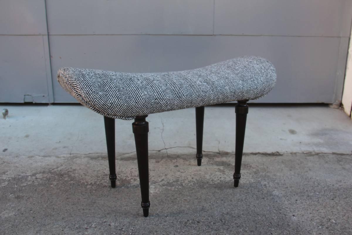 Particular Italian stool in the shape of a singular banana, feet in mahogany, seat in wool.