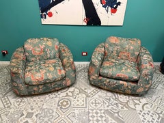 Pair of Art Deco armchairs with floral fabric and brass bases, 1940, Italy