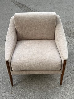 Poltrona Frau Dezza by Gio Ponti, 1970; beige fabric, chestnut-colored legs