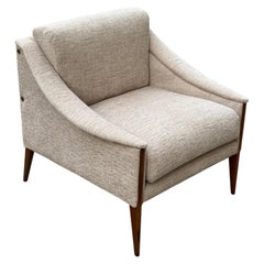 Poltrona Frau Dezza by Gio Ponti, 1970; beige fabric, chestnut-colored legs