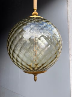 "Italia" Ball-Shaped Lantern, 1950; Murano-style glass in the Venini style; brass frame"