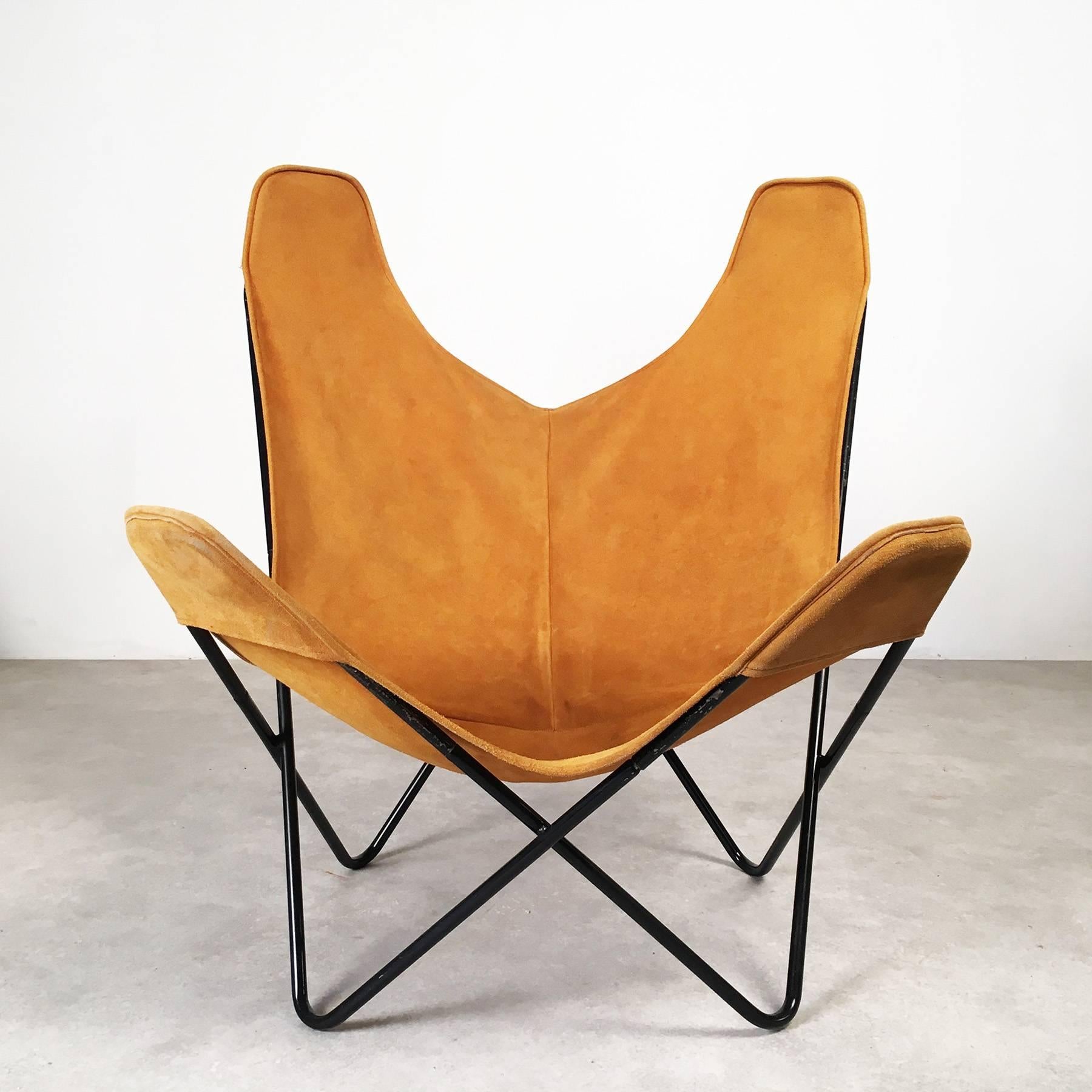Butterfly chair, designed in 1939 by Jorge Hardoy-Ferrari. This chair is one of the best-known icons of 20th century furniture design. The chair is spacious, light weight, and surprisingly comfortable.
The offered piece is a 1950s original from