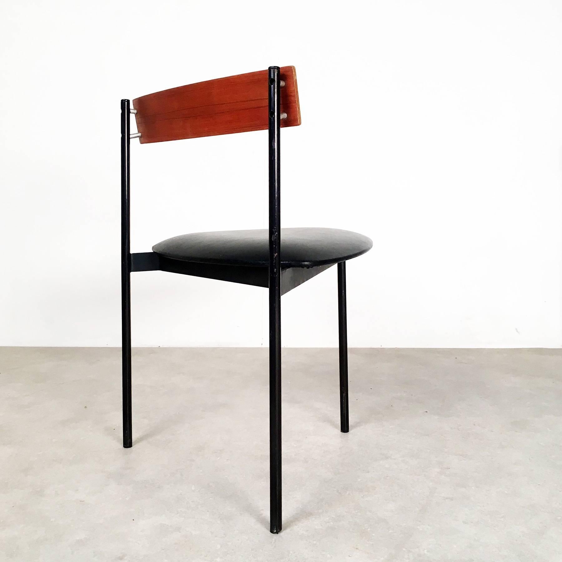 Four modernist Twen chairs, manufactured in the 1950s in Germany by Rego. Twen was a series of light weight furniture for young people - nowadays common, in the 1950s a revolutionary concept.

The chairs consist of black painted steel, teak