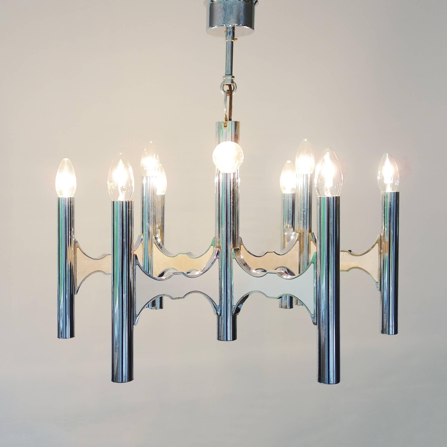 Chandelier, designed in the 1970s by Gaetano Sciolari. The lamp is made of chrome-plated steel. It is in a very cool and fully working condition.