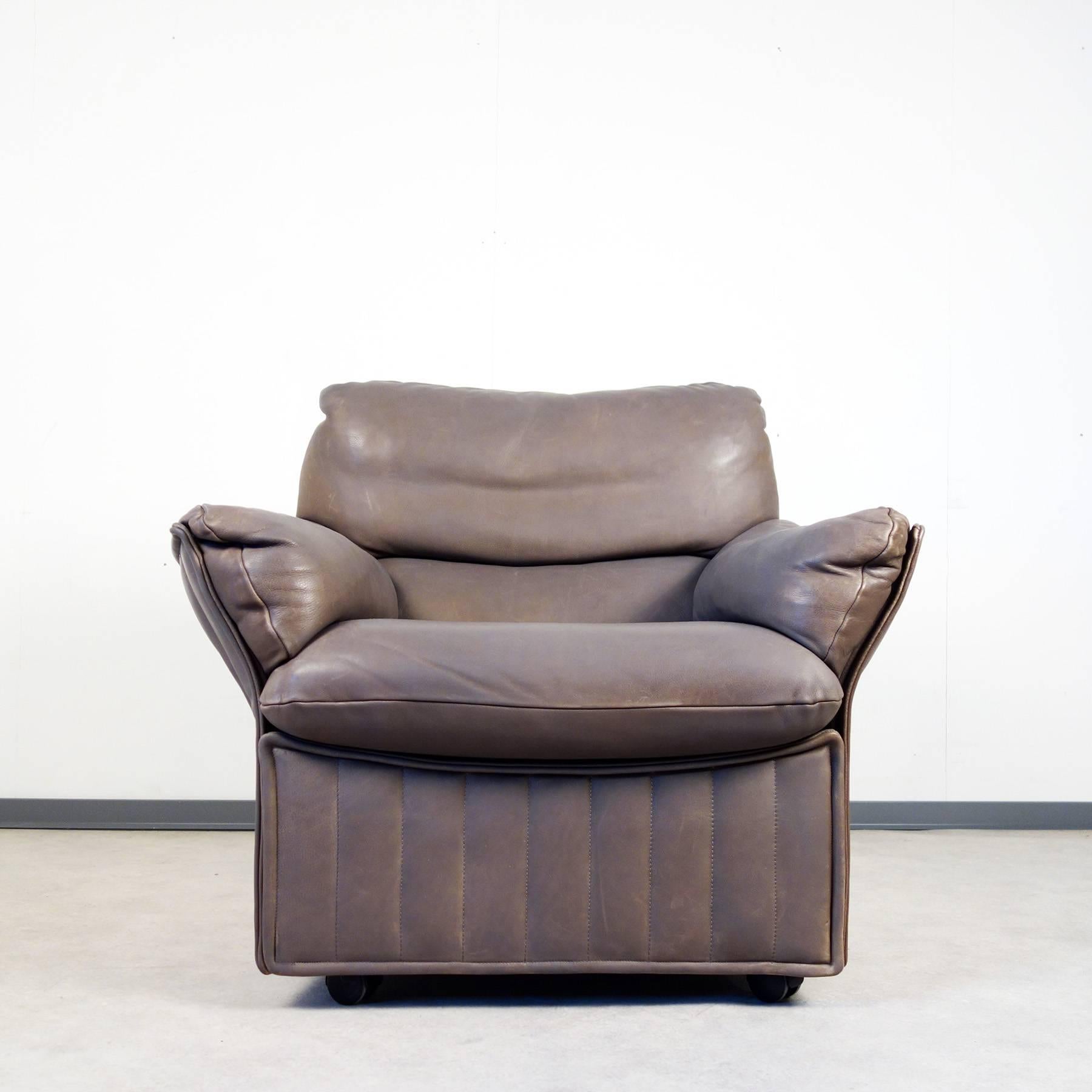 Stunning leather lounge suite from the 1960's, consisting of two two-seater sofas and a lounge chair. Design, materials, and craftsmanship of the suite are of an extremely high quality, which is a strong hint, that it has been produced by a