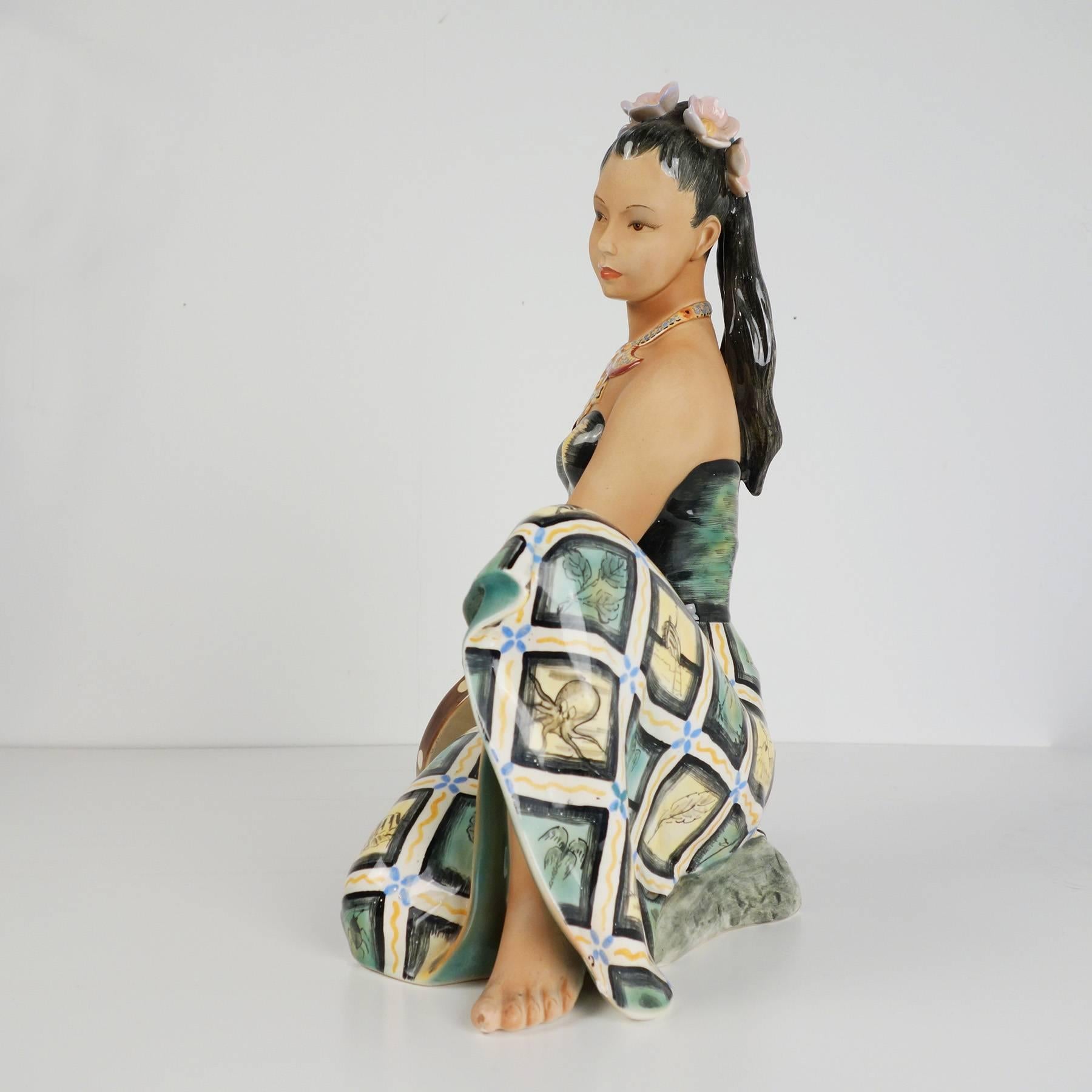 Beautiful big porcelain figurine, manufactured in the 1940s in Torino Italy by Le Bertetti. The figurine is executed unusually delicate and very expressive. It's hand-painted and glazed - partly mat, partly glossy.

The condition of the figurine