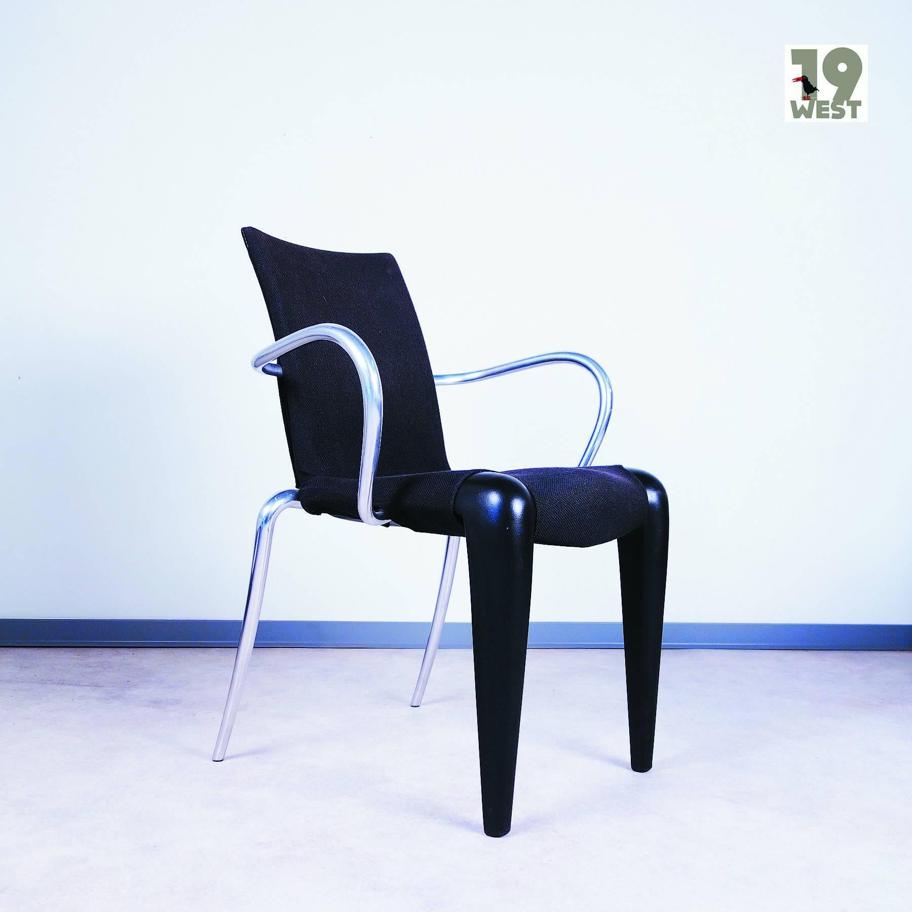 Louis 20 armchair, designed in 1991 by Philippe Starck, manufactured by Vitra. The chair is made of black plastic and polished aluminium and is equipped with a removable fabric upholstery. 
 
The condition of the piece is very good, with only