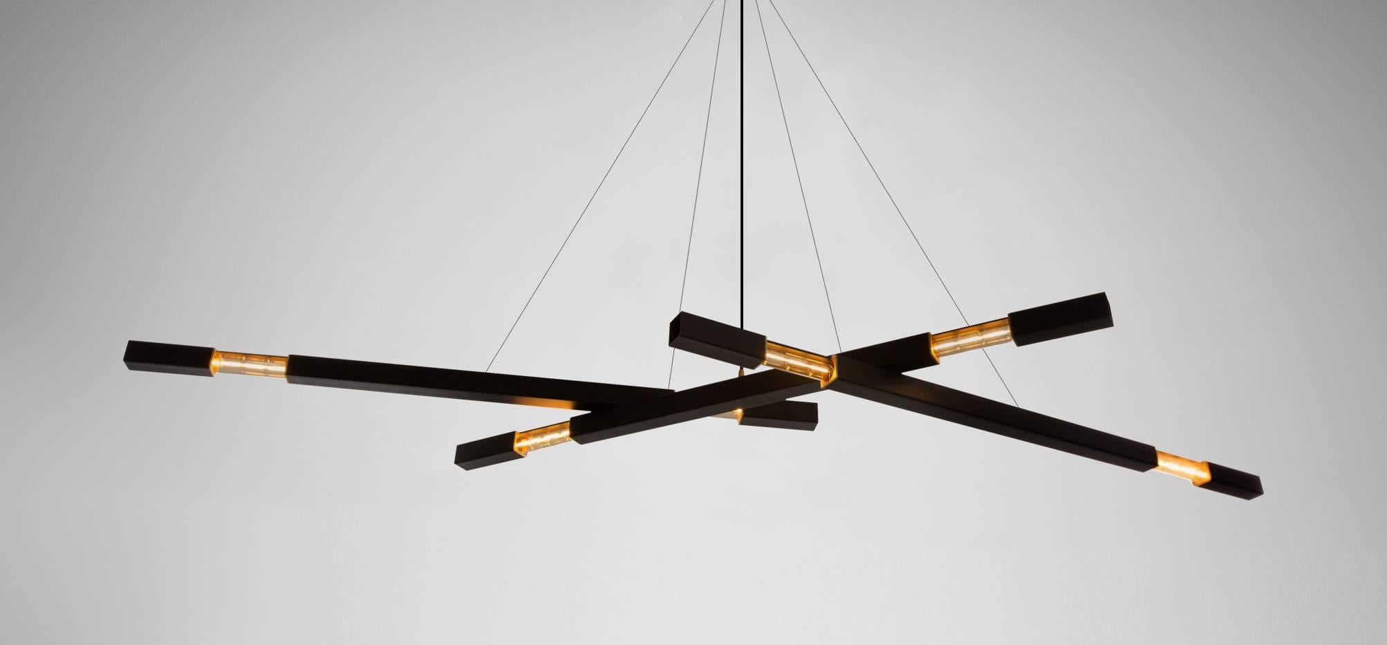 Daikon Stilk Chandelier features a trio of illuminated branches. Each branch is connected using swivel mounts. The swivel feature allows for horizontal movement of the branches. (Please see the Dynamic Stilk for horizontal and vertical movement.)