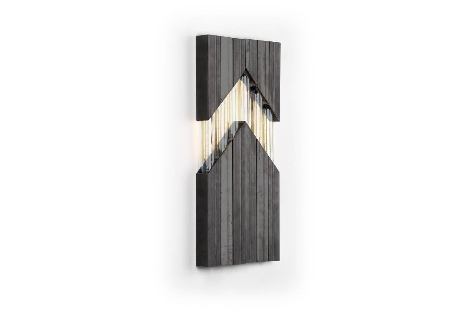 Daikon  Chevron Sconce

material options: steel, brass, stainless steel (for brass and stainless see alternate listing)

finish options:
steel -- industrial clear, onyx black wax, satin black, matte white
brass --brushed brass, polished brass, aged