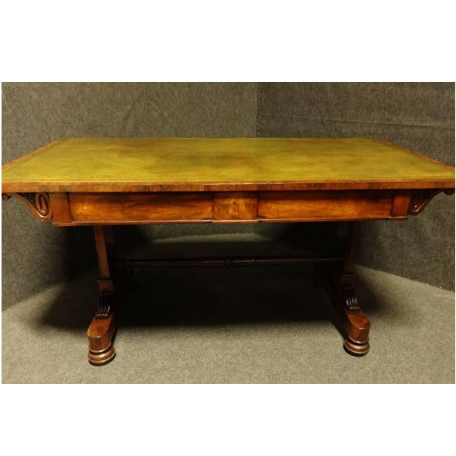 A very good Regency Rosewood library table, excellent color and original condition, double full depth drawers brass castors.