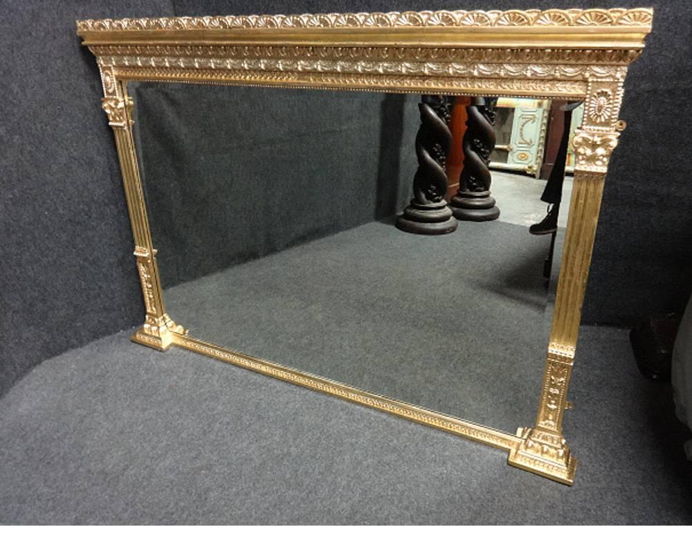 An excellent quality Adams style Victorian English overmantel mirror, with bevelled mirror, Corinthian columns, very pretty mirror.

Measures: 57