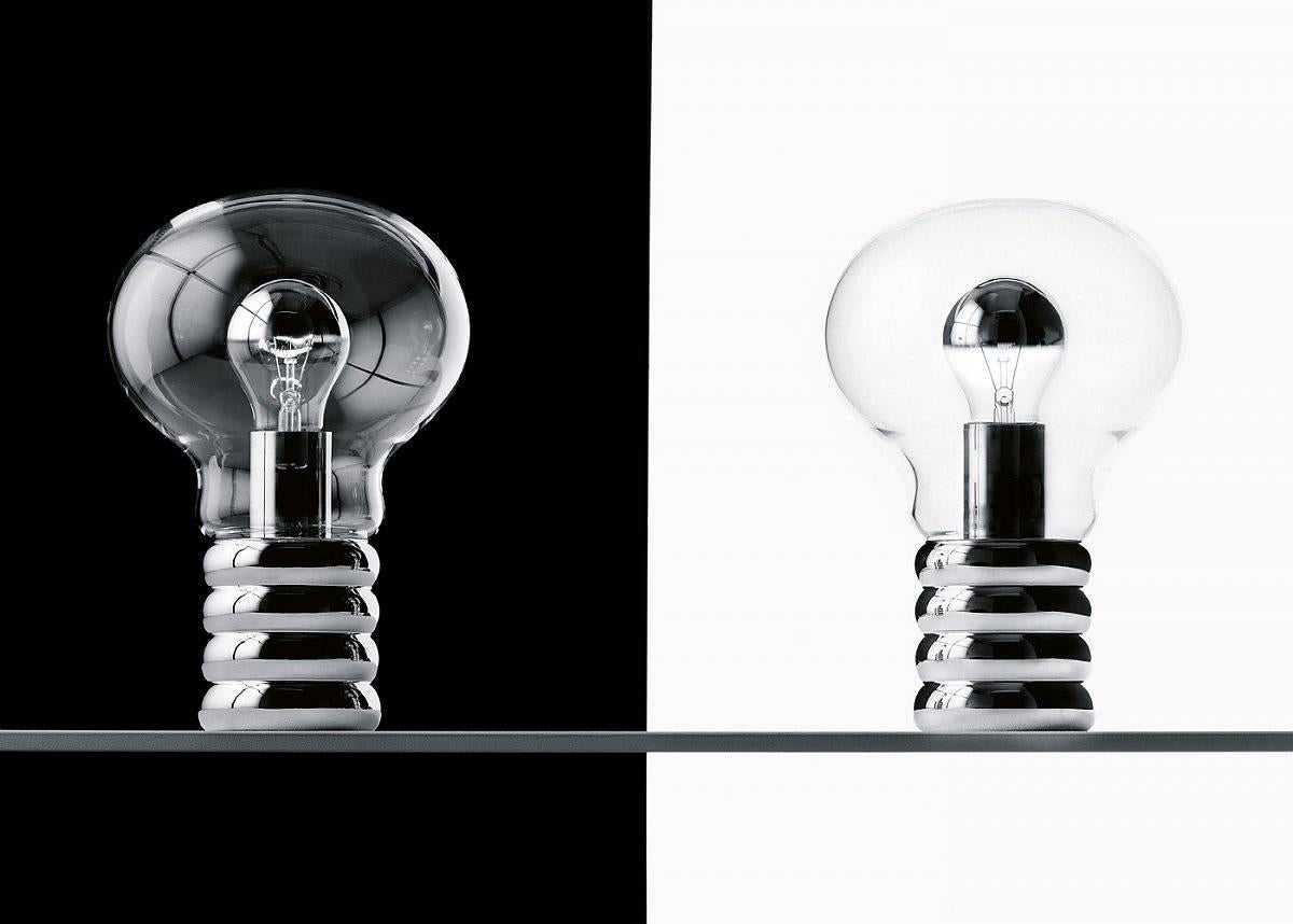 Bulb is made with a polished chromium-plated metal base and hand-blown crystal glass from Murano. 

Designed in 1966, Bulb was included in 1969 into the permanent design collection of the MoMA in New York. 

Light source
With top-chromated