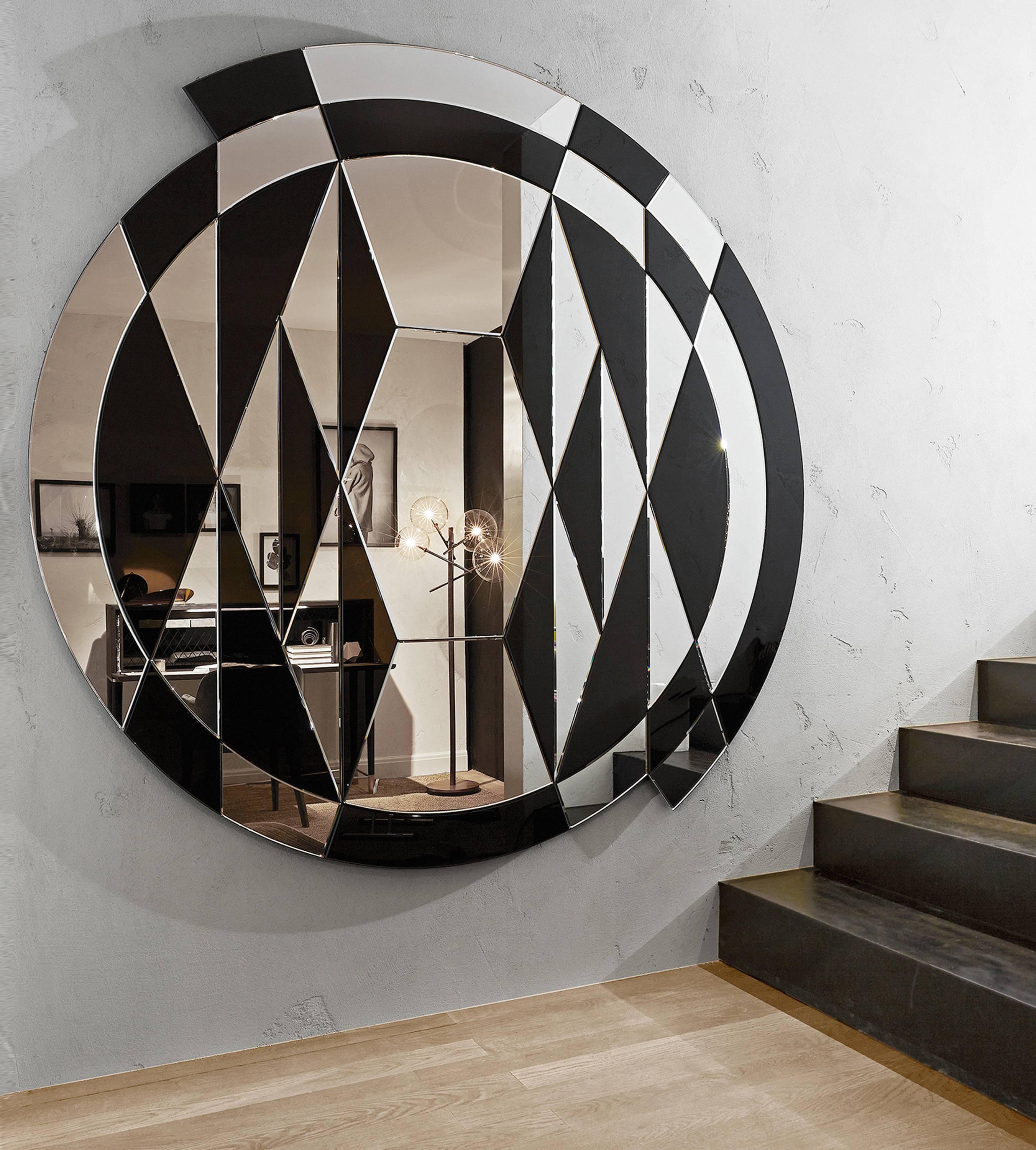 Beat Mirror by Pietro Rossi for Gallotti and Radice in Black and Bevelled Mirror. 

Mirror bevelled and polished by hand, bright black painted glass inserts. Made of 42 single sections.
Special limited edition.