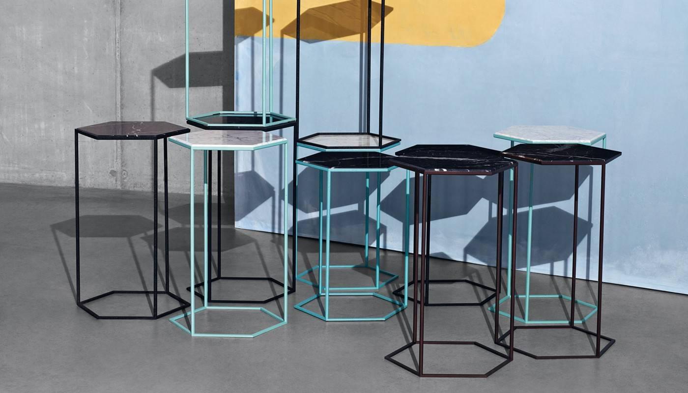 A perfect little side companion. The Hexxed table completes the 2014 metal collection which focuses on clean lines, nice details like the hexagon tubing and special finishes.
Coming in 2 heights and three color combinations. The powder coated