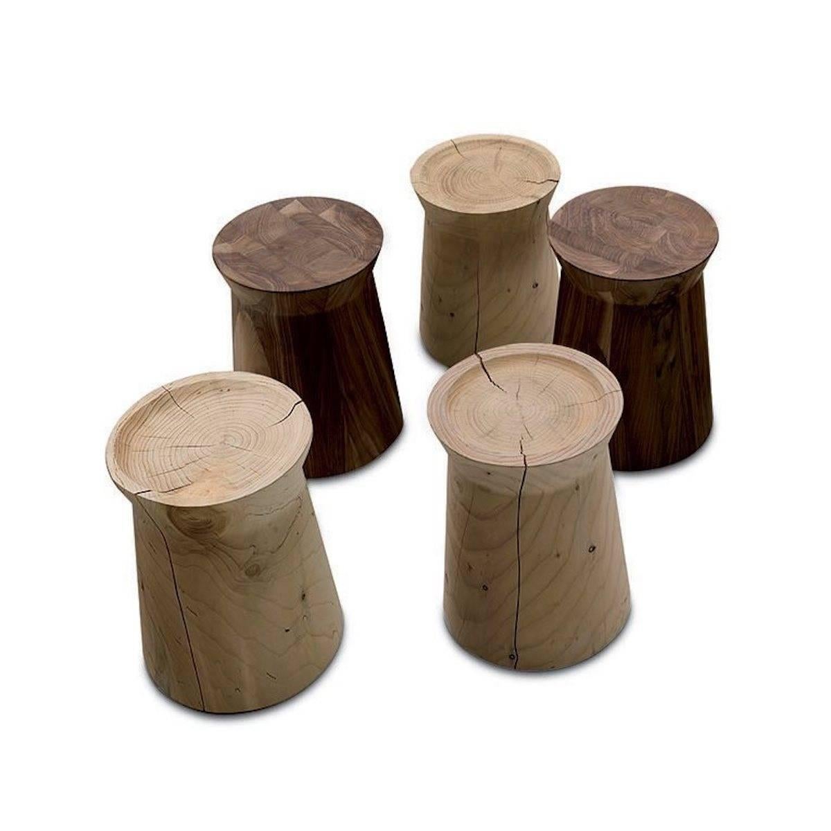 The seamless appearance is the key aesthetical characteristic of this table or stool available in two different finishing’s: Canaletto walnut and cedar wood.

Notes: Splits or cracks of cedar are peculiarities of solid wood products, therefore