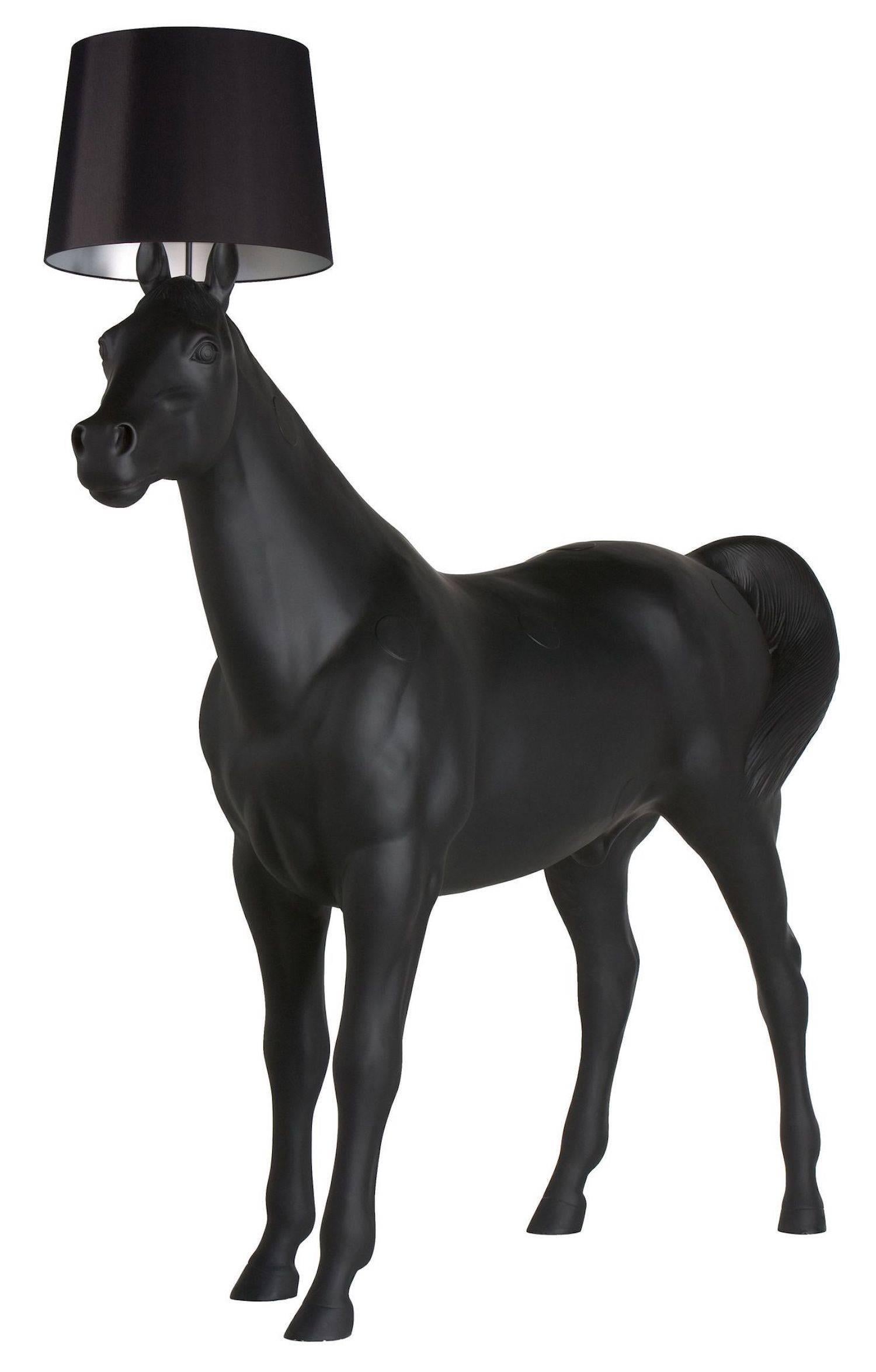 Designed by Front Design, the Horse Lamp is a full scale Horse floor lamp made of PVC viscose laminate shade, a metal frame structure and polyester Horse.

For indoor use only. The inside of the shade has a silver grey color which reflects the