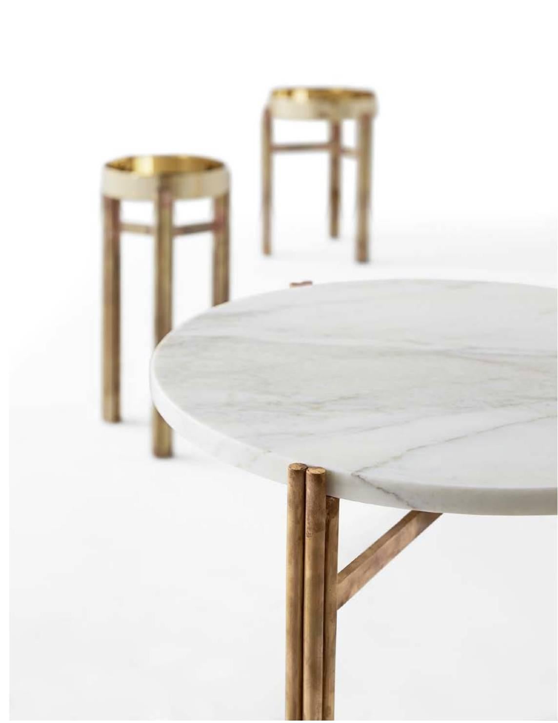 Coffee or side table with Calacatta Vagli Oro marble top or with bright brass plate. Hand burnished brass structure. Price listed is for the extra large size of 31.5 x 31.5 x 10 H. Please inquire for pricing on alternative sizes.

Sizes available: