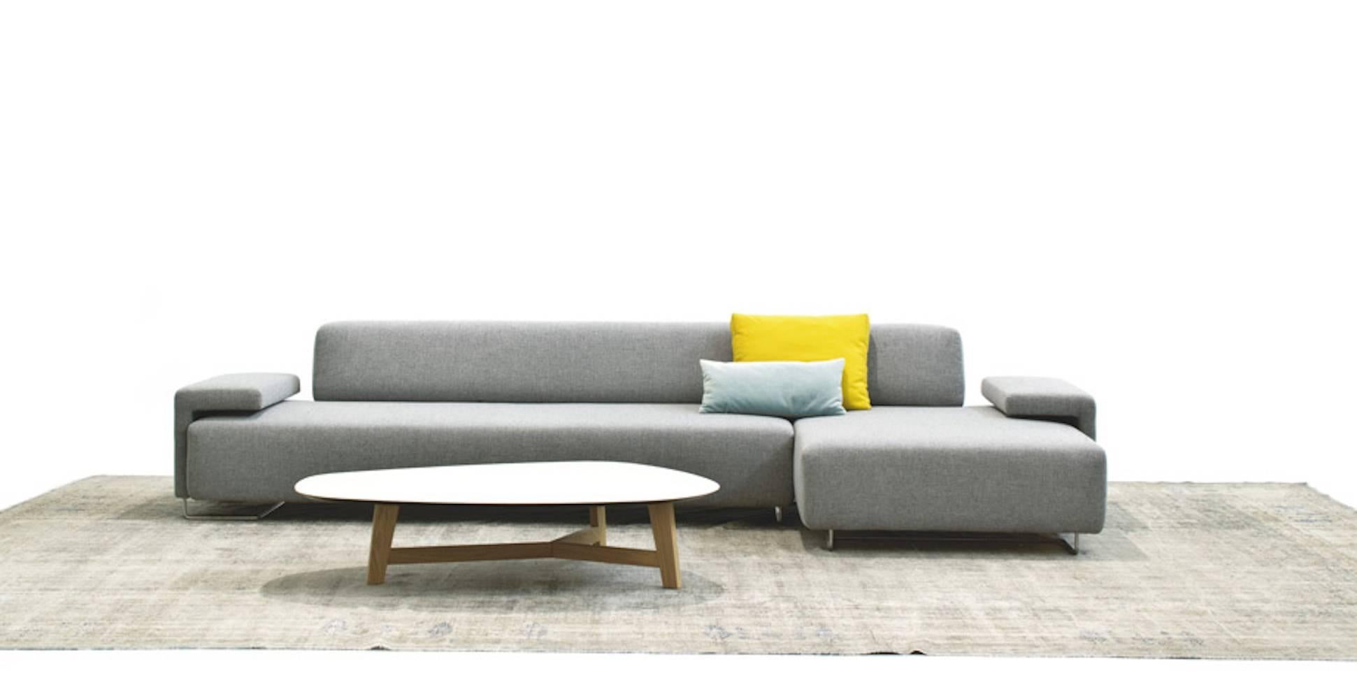 Lowland sectional sofa in right or left configuration in grey Steelcut Trio 133 Fabric 

A sofa, a changing landscape made from elemental shapes which dynamically interact with one another. Patricia Urquiola deconstructs the Classic sofa, and