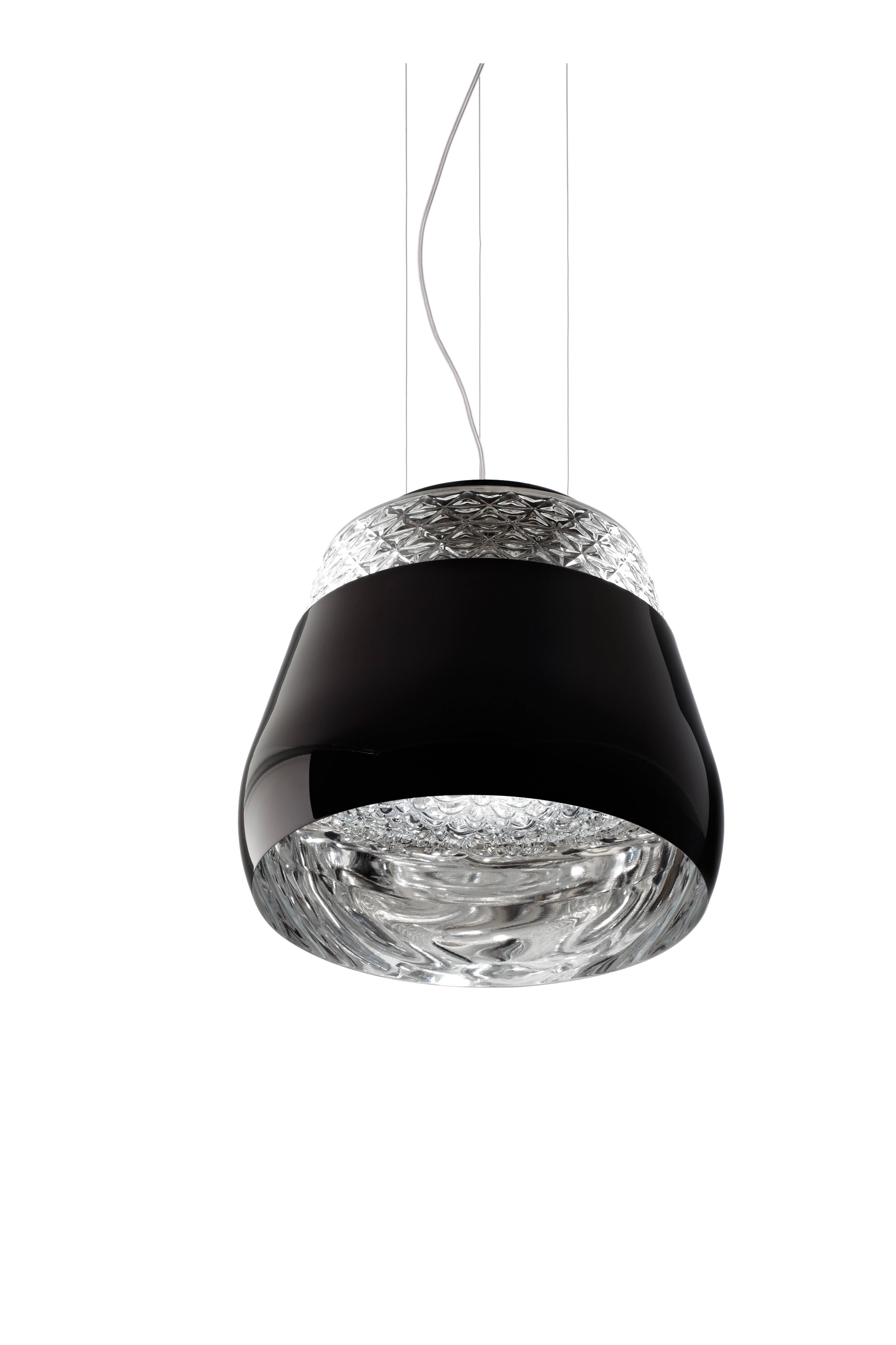 Crystal clear blown glass with chromed, gold-plated or lacquered shade, transparent cord and three steel cables.