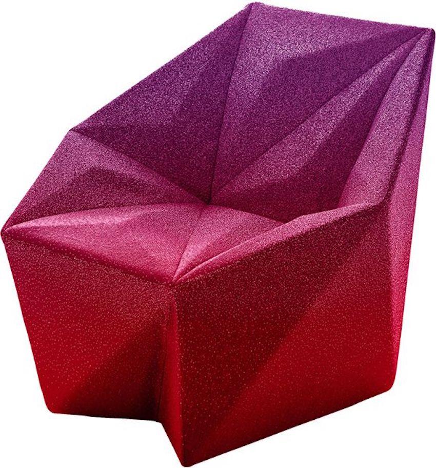 Moroso Gemma chair by Daniel Liebeskind in Fuchsia and purple blur fabric.

The Gemma collection was developed around the idea of contrast and experience derived from the perception of a shape. The sharp asymmetry of its three-dimensional geometry