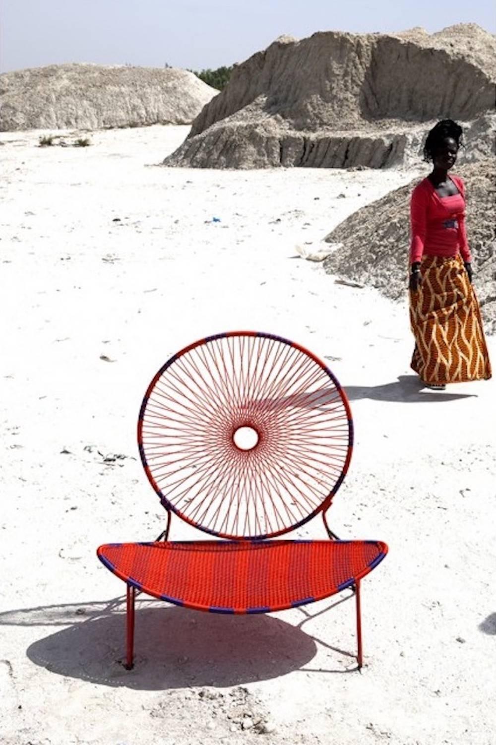 O)< chair is part of the M’Afrique collection, a range of furniture conceived by the various designers for Italian furniture manufacturer Moroso. Produced by African craft weavers using the yarn of fishing nets; the designs are all different and