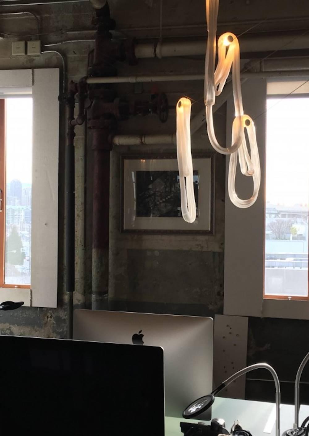 87.3 features three pendants suspended from a canopy and swag hook. Pendants can be hung from any number of optional swag points mounted on or away from the canopy.

Soda water is used to trap air in a super heated glass matrix, which is