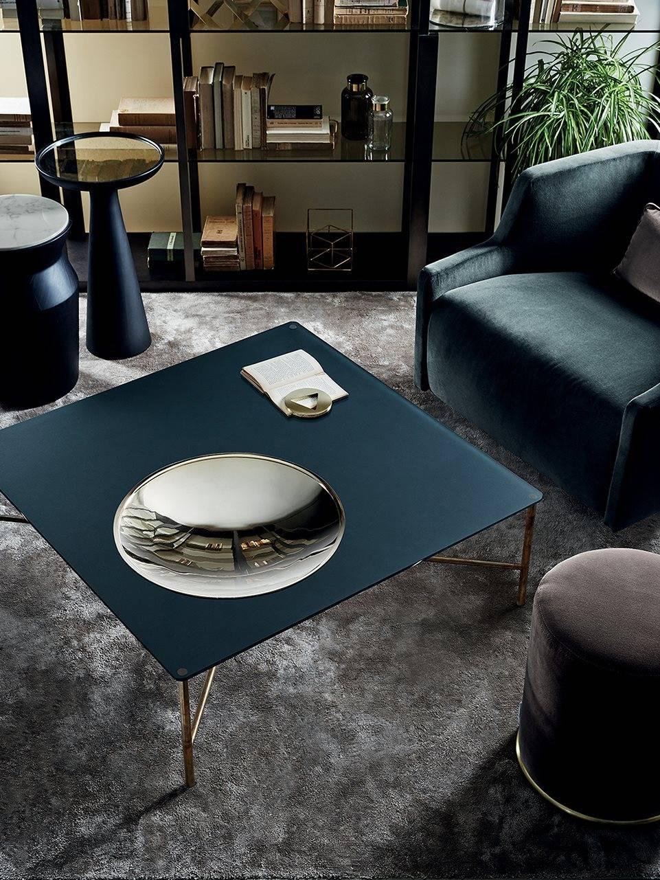 Coffee table with 12mm extralight transparent tempered glass top. 
Painted glass as per samples in the bright or satin version on request. Plate in bright brass. 
Structure in hand burnished brass. 

The hand burnished brass finish looks naturally