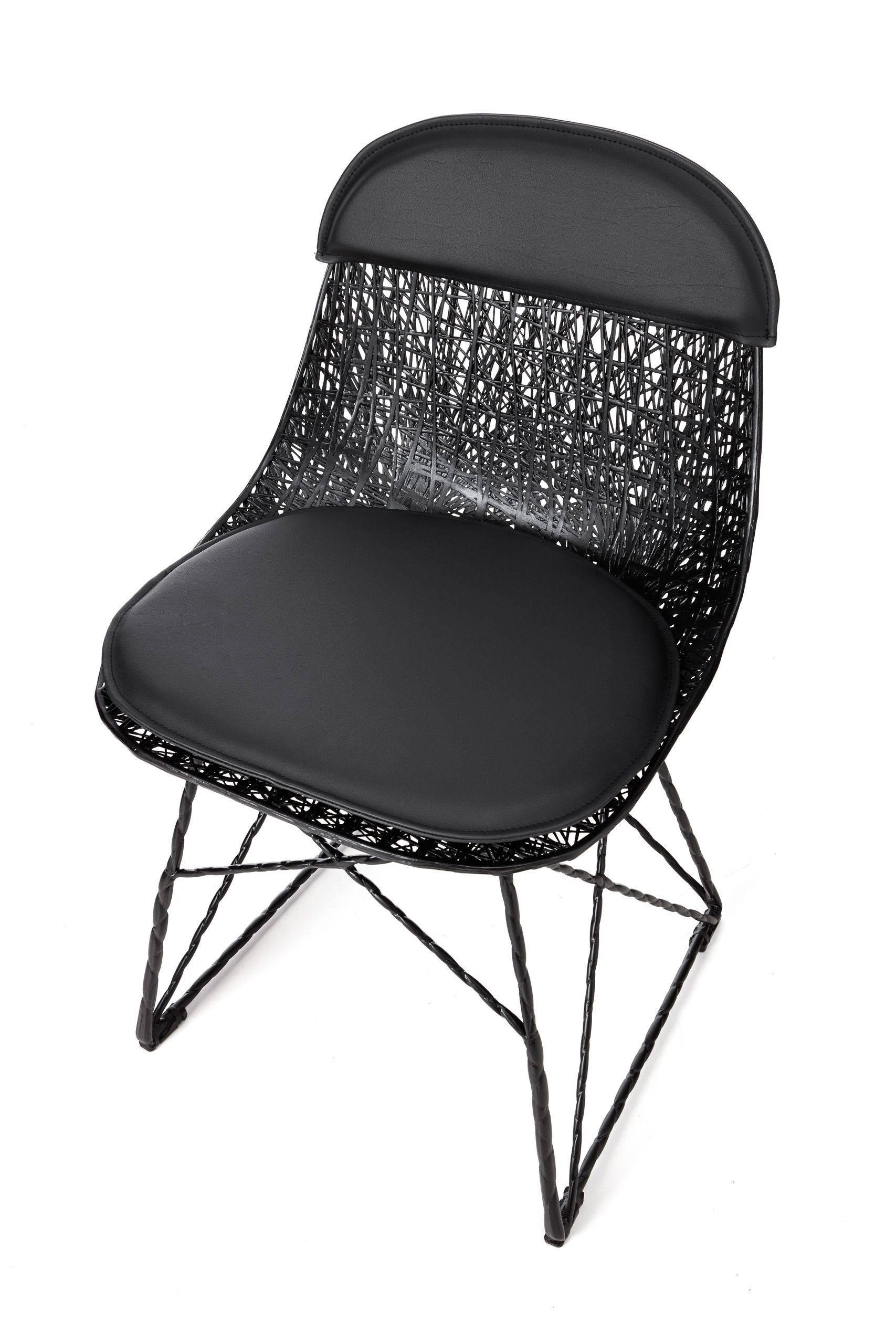 Carbon chair
by Bertjan Pot and Marcel Wanders

Carbon chairs of Bertjan Pot and Marcel Wanders speaks of dedicated craftsmanship in connection to high tech materials only made possible by personal excitement, passion and enlightenment. 

For