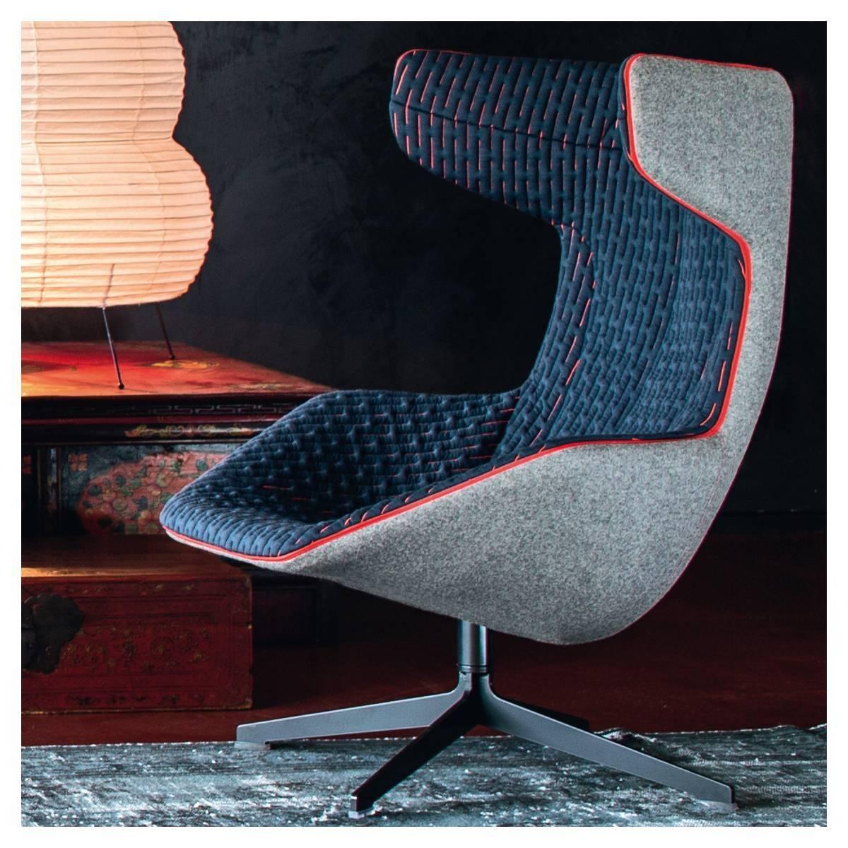Moroso Take A Line For A Walk lounge chair in Quickship by Alfredo Haberli with removable quilt and swivel base.

Injected flame-retardant polyurethane foam over internal steel frame. Removable quilt with zippers is polyester/polyamide/ool/elas- tan