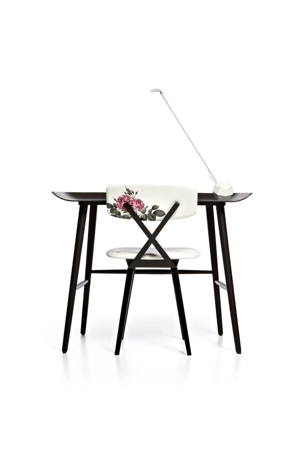 Moooi Woood secretary desk by Marcel Wanders in black stained oak.

A personal desk, a private home office, a sided side table, a fruit bowl for your apples. 

Top features a 50 mm plug hole for your charger. A discreet outlet for cable