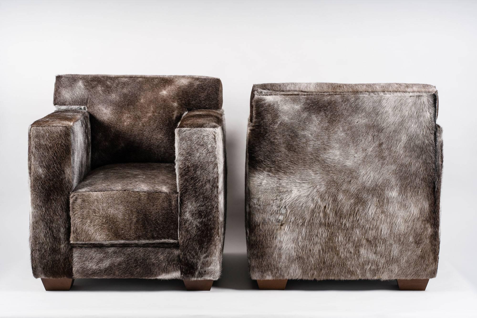 Wonderful pair of armchairs
Upholstery with rare pony hides
Solid oak legs.
Measures: H 83 cm
W 80 cm
D 83 cm
SH 43 cm.