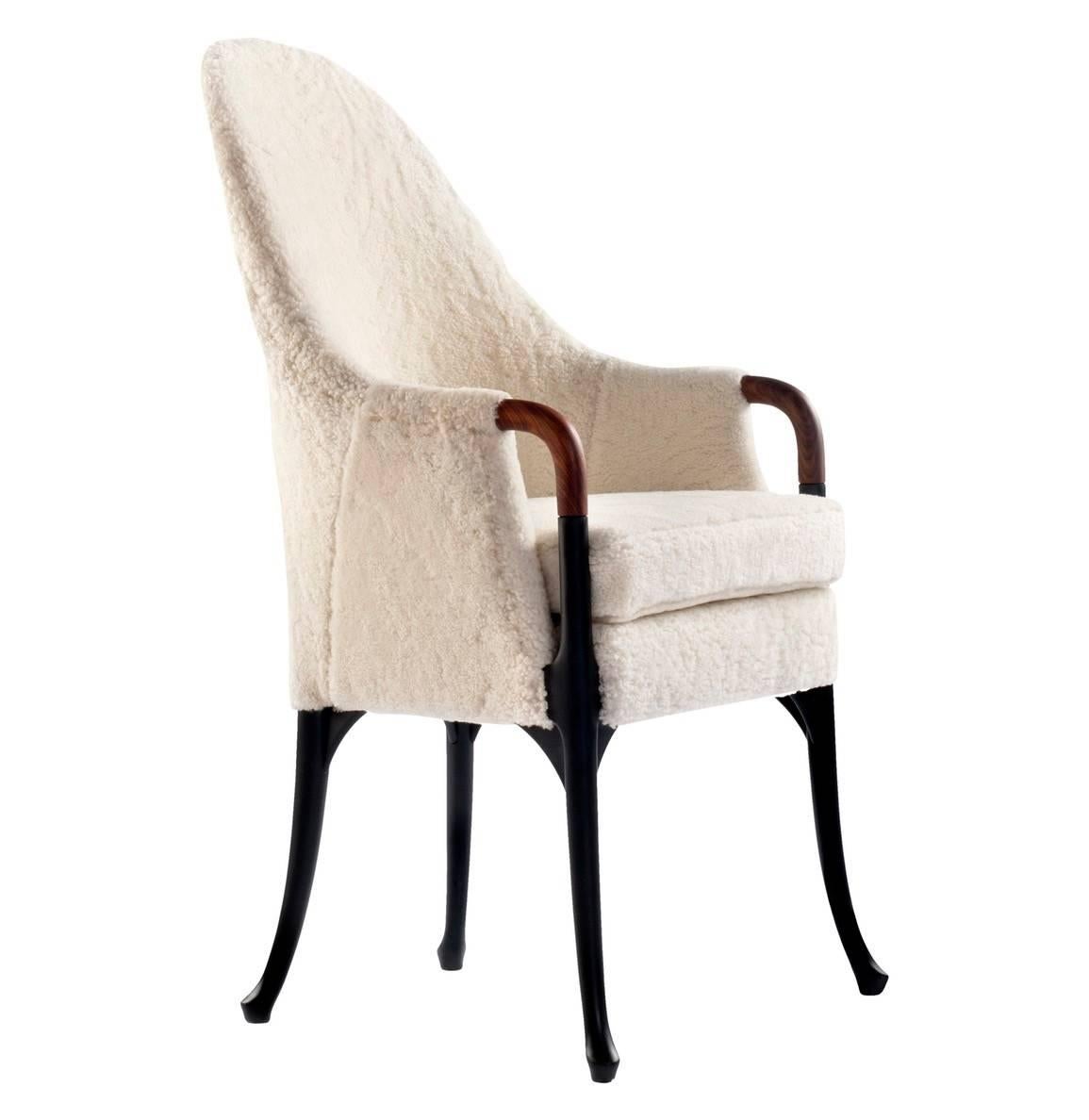Pair of Giorgetti armchairs with white shearling upholstery.
Upholstery handmade in France by Norki.
Seven armchairs are available.
Armchair in solid beechwood with polished or lacquered legs.