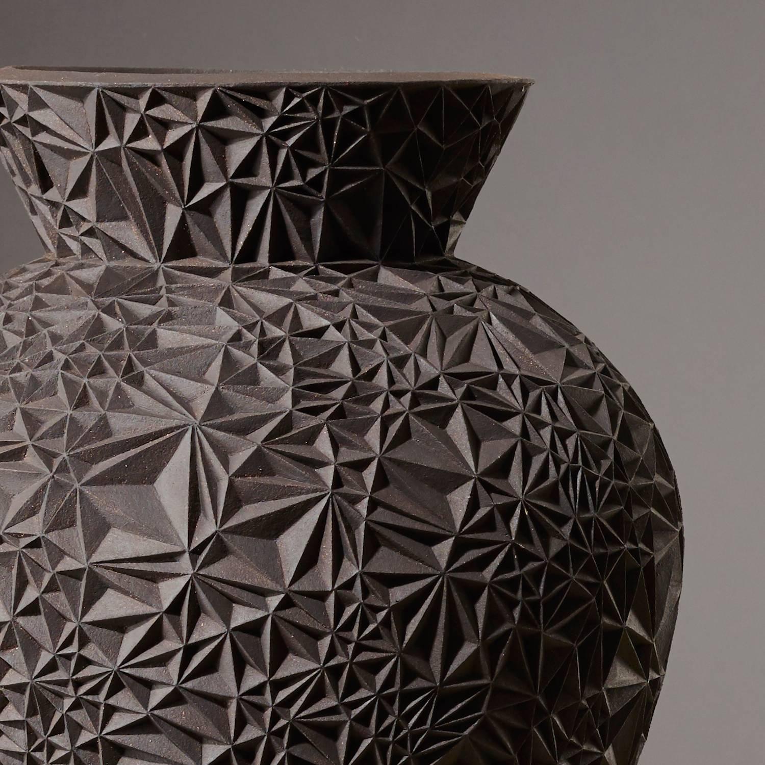 carved ceramic vases