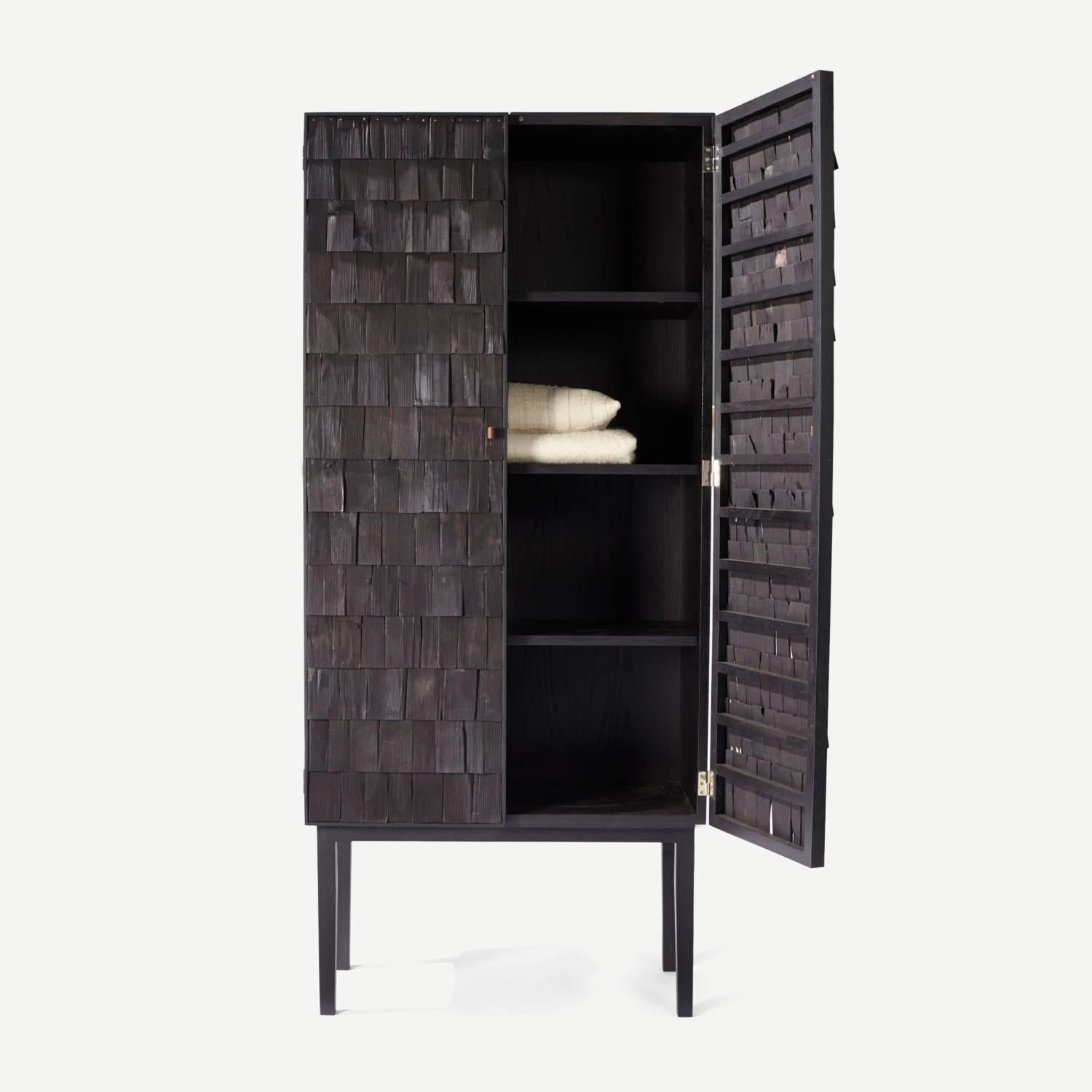 Scorched “Shake” cabinet by Sebastian Cos and benchmark furniture. A contemporary cabinet constructed with blackened shakes in chestnut and ash timber. Blackened exclusively for the new craftsmen, each shake a type of shingle commonly used in Japan