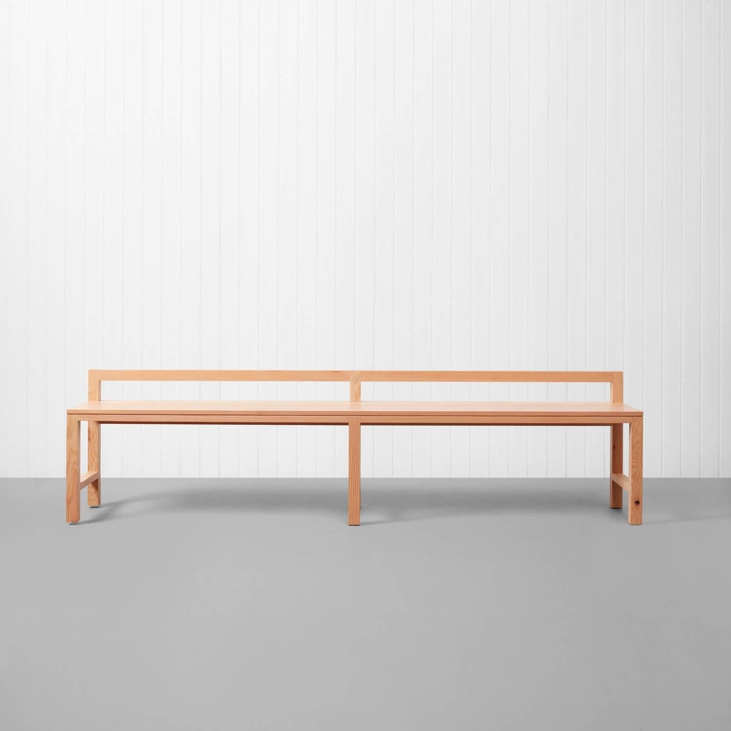 Stumpy is a low-backed bench with clean, architectural lines and square legs and low backrest.

It is available in four sizes from 1.5m up to 2.4m and offers an impressive sense of perspective at full length. As with PLANK, STUMPY is available
in